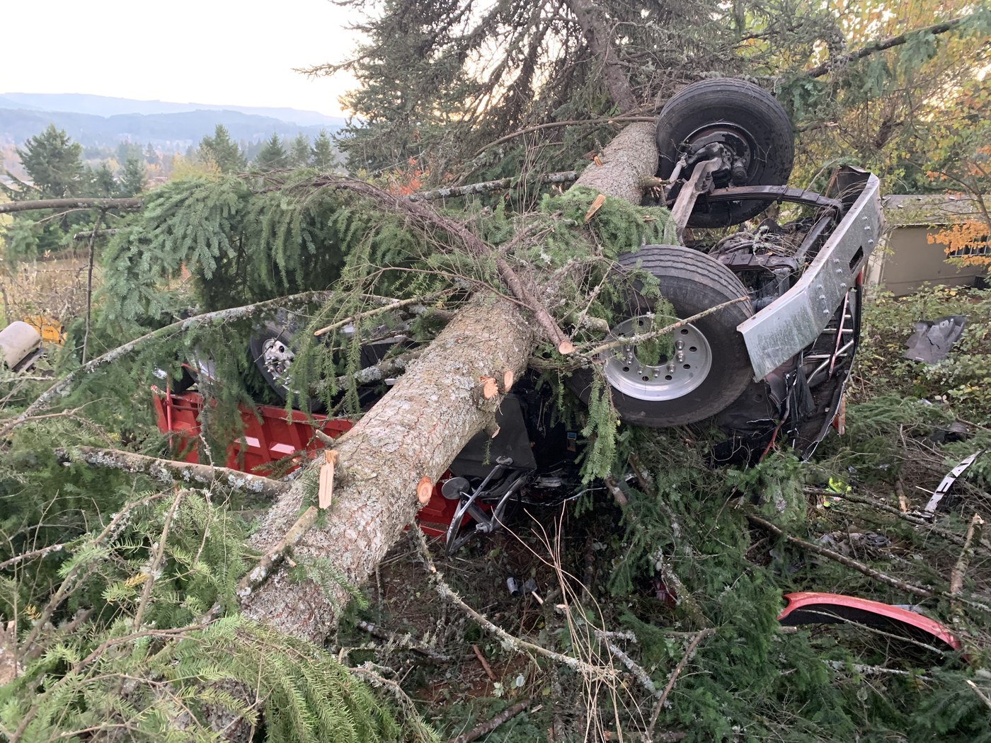 Lt. Hardy atop overturned vehicle, Willamette Valley